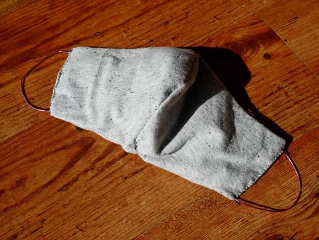 Homemade gray face mask - stay at homeの写真素材