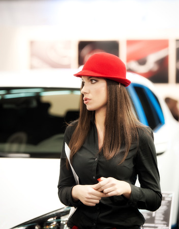 The young beautiful girl in a red hatのeditorial素材