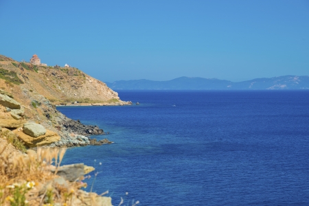 Greece Syros, wide sea view by church with clear blue sky above sea water at summer time,Greece Cyclades islandsの写真素材