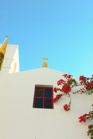 Greece, traditional church view with flowers in Mykonos capitolの写真素材