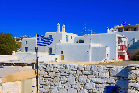 Greek flag waving in Mykonos island Greece cycladesのeditorial素材
