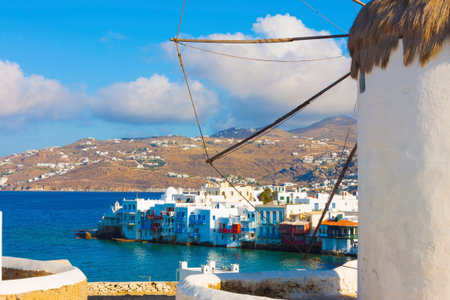 Little Venice view with a windmill part in the frame in Mykonos island in cyclades Greeceのeditorial素材