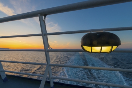 Sunset from ship at Mediterranean Sea during tour in Greece to Greek Islandsの写真素材