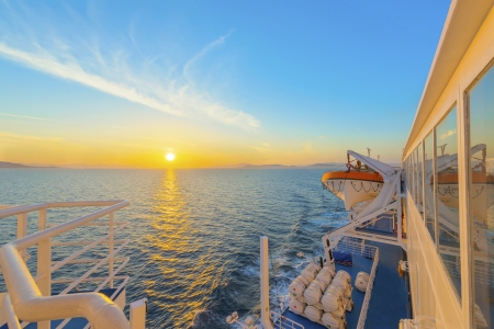 Sunset from ship at Mediterranean Sea during tour in Greece to Greek Islandsの写真素材
