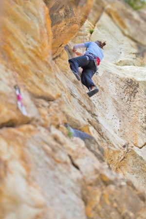 Woman Climbing in Greek mountainの写真素材