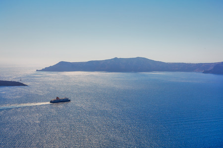 Greece Santorini island in Cyclades, traditional view of caldera with cruise ships