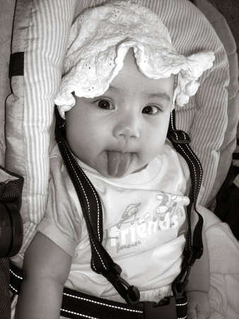 Einstein Junior, Baby shows tongue like Albert Einsteinの写真素材