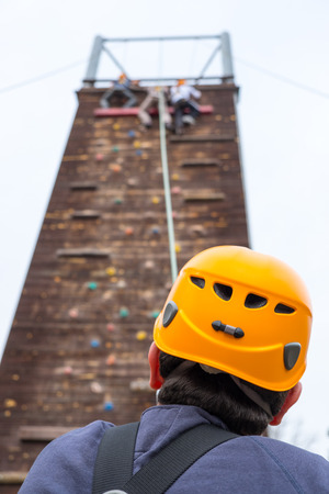 climbing wood wall at safety adventure parkの写真素材