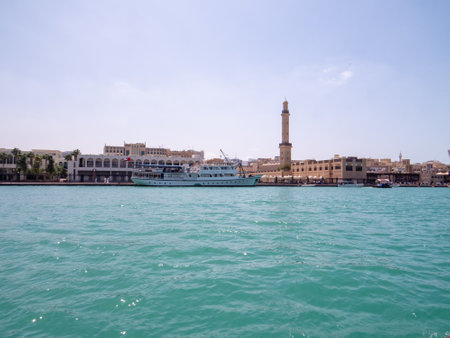 Dubai, United Arab Emirates. Dubai creek and boardwalk in Deira with the view of old Dubai in United Arab Emiratesの写真素材