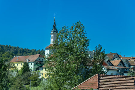Rural landscape, country road near the forest, in Dolenje Skopice, Sloveniaの写真素材