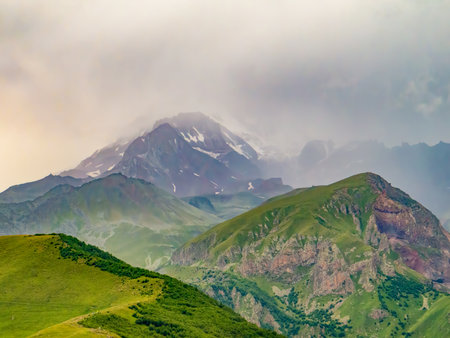 Kazbegi Mountains in the morning surrounding the small town of Kazbegi in Georgia. Landscape on Kazbegi Mountain in the Greater Caucasus Mountains in Georgiaの写真素材