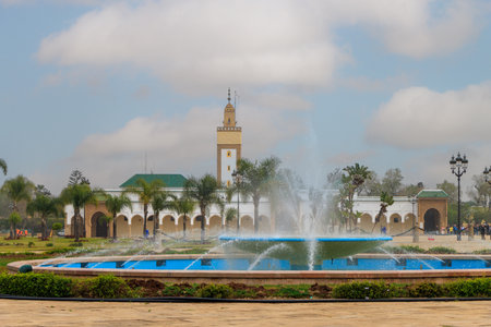 RABAT, MOROCCO. Fountain and palace in african capital city, clear blue sky in warm sunny winter day.の写真素材