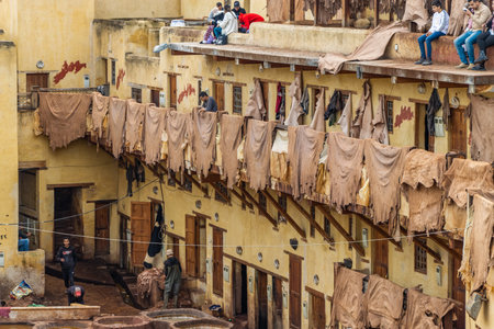 Old tanks of the Fez's tanneries with color paint for leather, Morocco, Africa. The Fez dye works. Leather dressing according to ancient technologies.の写真素材