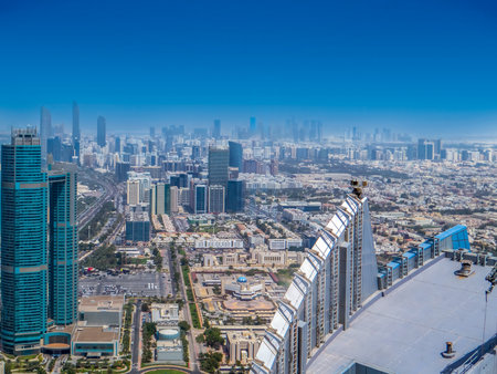 Abu Dhabi. UAE. Aerial cityscape of Al Reem Island at hazy morning, showing the reflection on skyscrapersの写真素材
