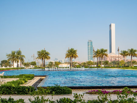 Abu Dhabi with palm trees and skyscrapers. Sunny summer in UAEの写真素材
