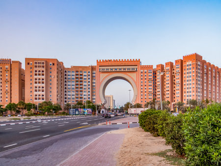 Dubai, UAE. Oaks Ibn Battuta Gate hotel building architecture with cityscape and road surroundingsの写真素材
