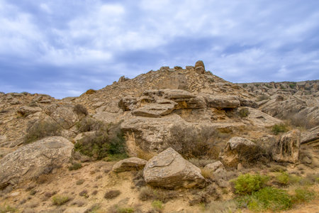 Baku, Azerbaijan. Qobustan National Park in Azerbaijan is famous for its ancient rock carvings, mud volcanoes, and dramatic desert landscape.の写真素材