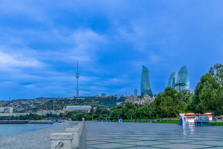 Baku, Azerbaijan. Baku's Flame Towers rise against the Caspian Sea, blending urban skyline with coastal beauty in the heart of Azerbaijan's capital.の写真素材