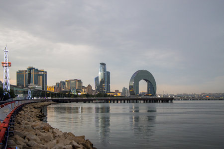 Baku, Azerbaijan. A modern skyscraper in Baku. The reflective surface of the modern glass.の写真素材
