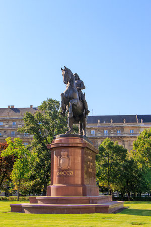 Budapest, Hungary. Hungarian Parliament in Budapest with Ferenc Rakoczi II statue on a sunny day.の写真素材