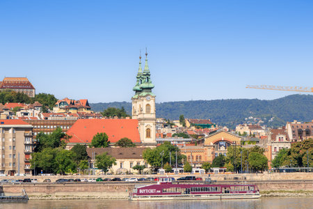 Budapest, Hungary. View of a Budapest cityscape over river Danube with historical and famous monuments rising up from the shore during a beautiful sunny day. Beautiful landmarks of the city.の写真素材