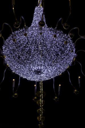 Seasonal decorations in London streets to create a festive atmosphere and attract christmas shoppers.の写真素材