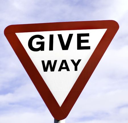 Sign or symbol telling motorists, cyclists or pedestrians where to go and what to do.の写真素材