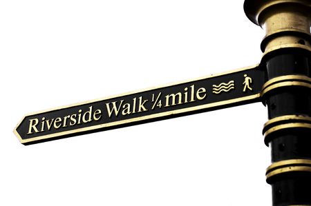 Sign or symbol telling motorists, cyclists or pedestrians where to go and what to do.の写真素材