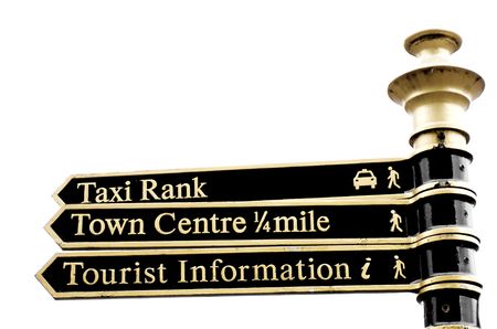 Sign or symbol telling motorists, cyclists or pedestrians where to go and what to do.の写真素材