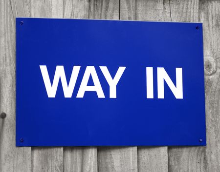 Sign or symbol telling motorists, cyclists or pedestrians where to go and what to do.の写真素材