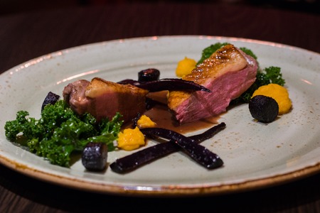 Dish on a elegant plate with wegetablesの写真素材