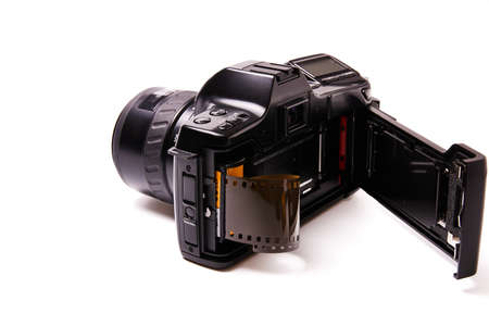 Analog black camera with 35mm photo reelの写真素材