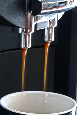 hot coffee from espresso machine の写真素材