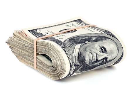 folded hundred dollar bills isolated on white 