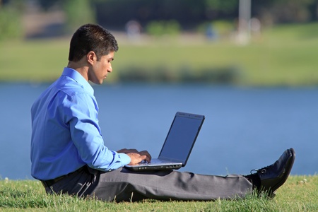 young businessman with laptopの写真素材
