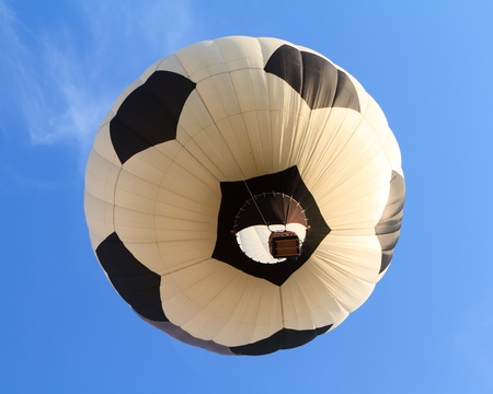 hot air balloon in shape of soccer ballの写真素材