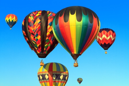 hot air balloons over blue sky の写真素材
