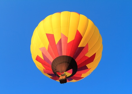 hot air balloon over blue skyの写真素材