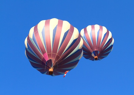 hot air balloons over blue skyの写真素材