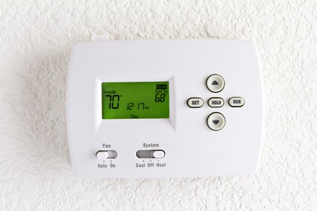 digital thermostat on white wallの写真素材