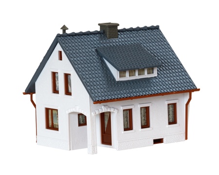 miniature house isolated on white background の写真素材