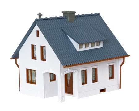 miniature house isolated on white background の写真素材