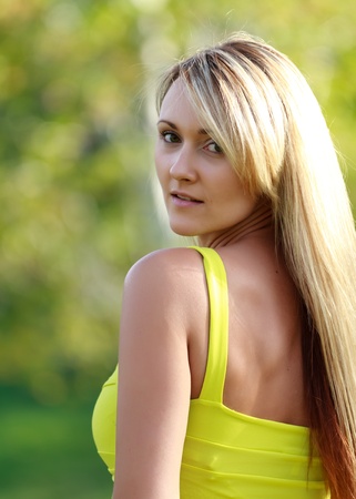 attractive young woman outdoorsの写真素材