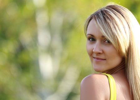 attractive young woman outdoorsの写真素材