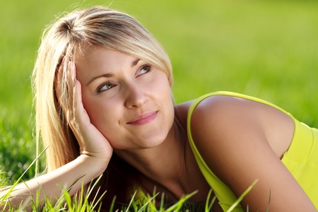 happy young attractive woman outdoors の写真素材