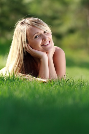 happy young attractive woman outdoorsの写真素材