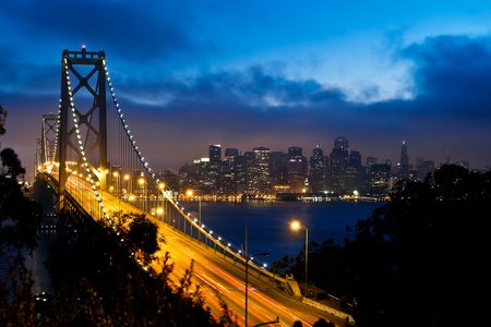 Bay Bridge with San Francisco city view after sunsetの写真素材