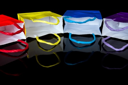 colorful shopping bags on black 
