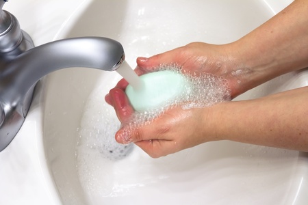 cleaning hands with soap の写真素材