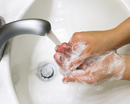 cleaning hands with soap の写真素材
